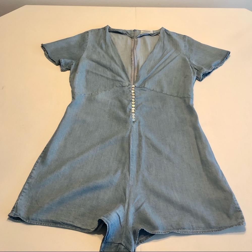 Light denim jumpsuit.